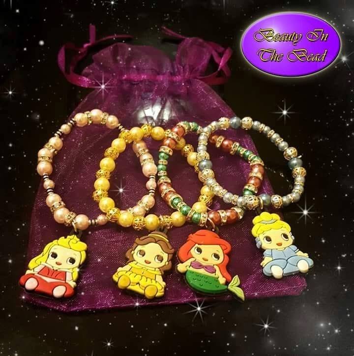 Beauty in the Bead's colourful beaded charm bracelets, with the original purple logo